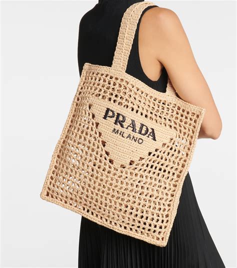 prada bags beach